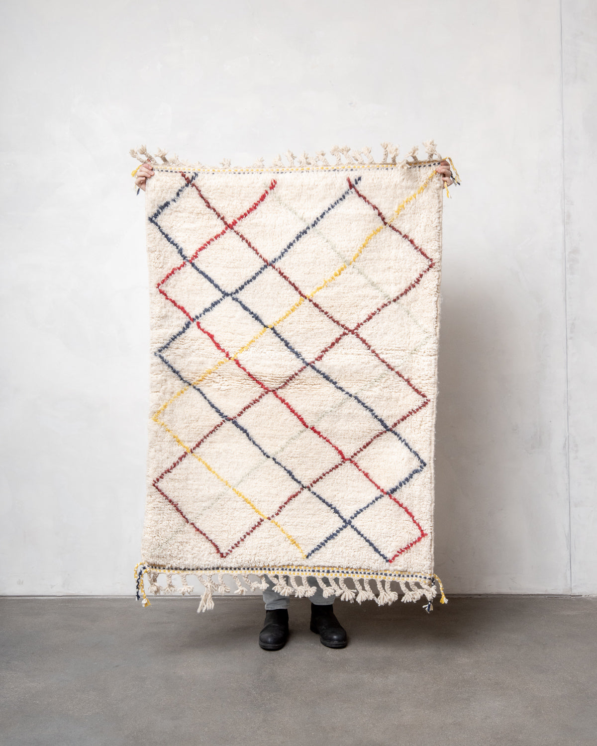 Modern, designer, handcrafted Berber rug from Morocco. Beniourain carpet with beautiful colours and patterns and fluffy wool texture.